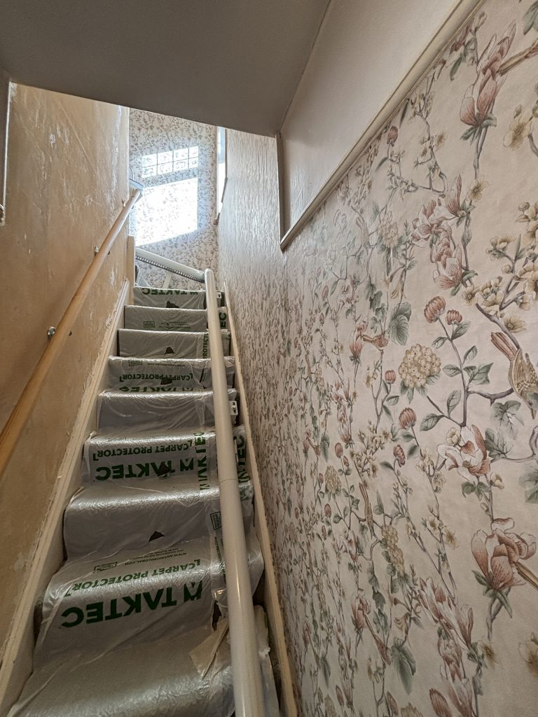 Wallpaper installation on staircase in Southampton with smooth finish and clean edges