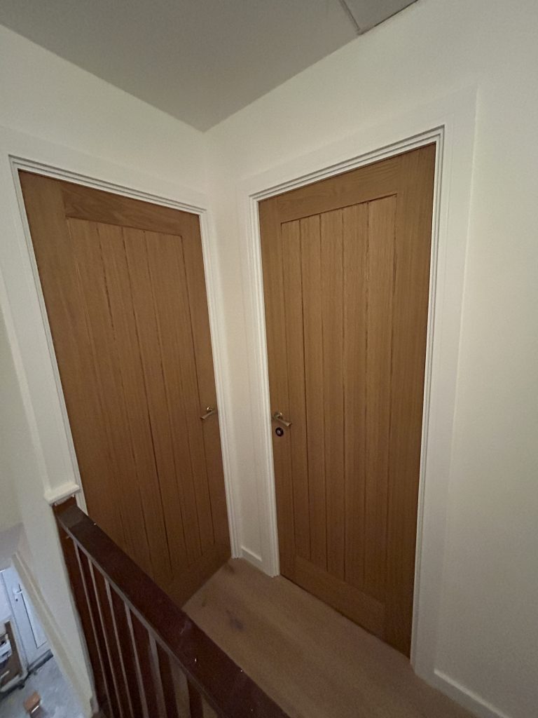 Interior wooden doors before painting in a Southampton home