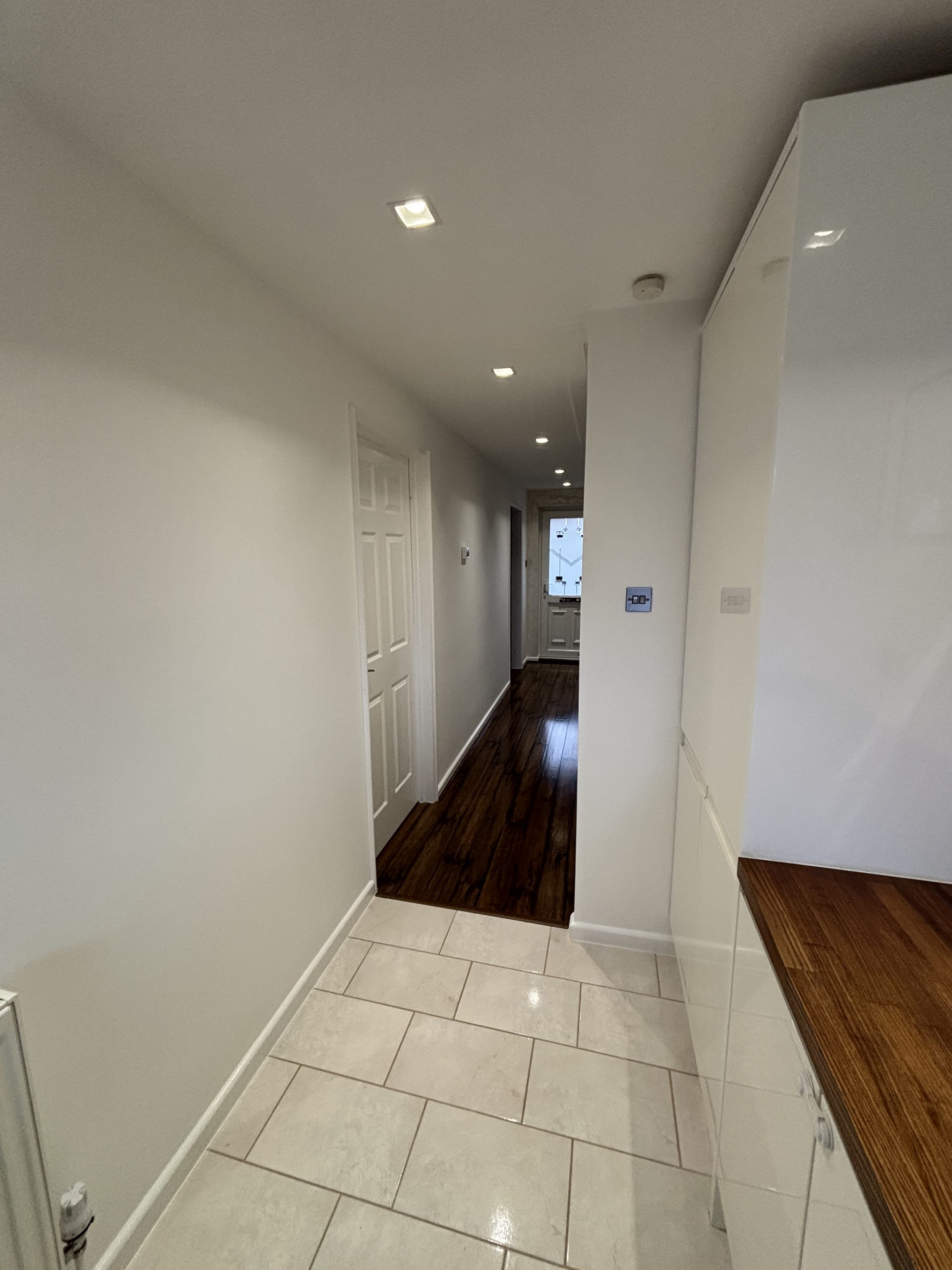 Professional interior painting in Southampton hallway with clean white finish