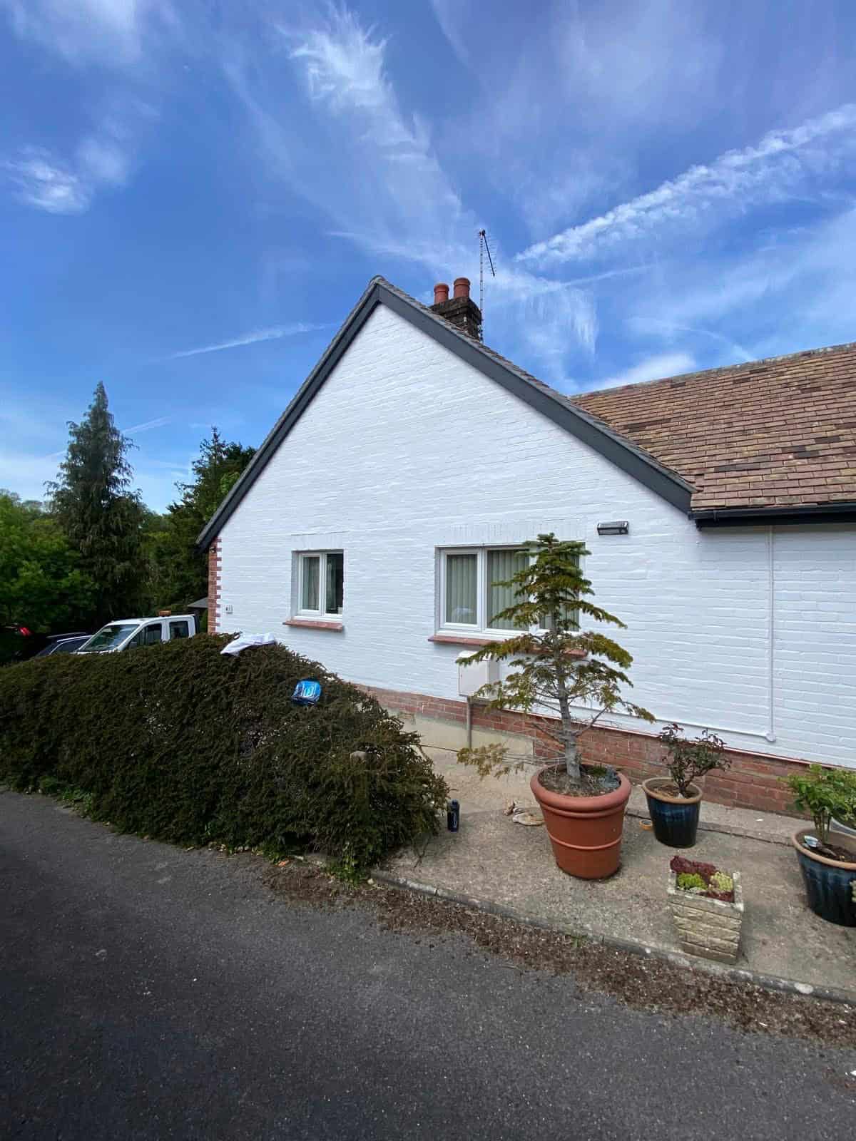 Freshly painted house exterior in Southampton with bright white masonry finish