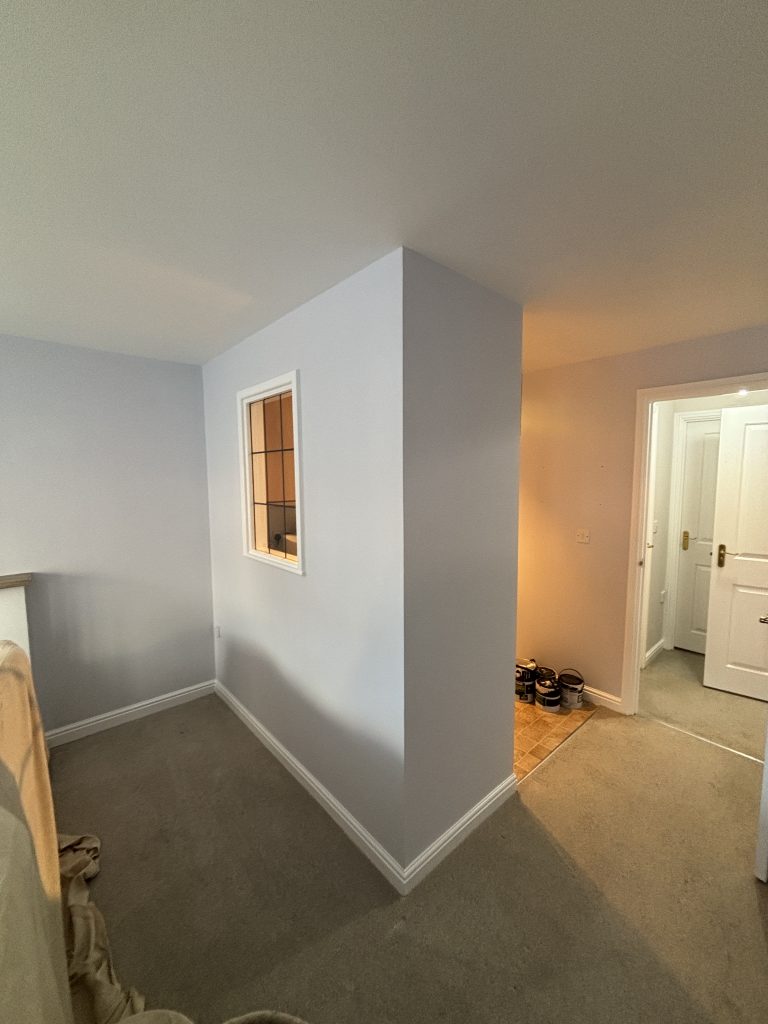 Finished room after painting and decorating in Southampton with clean walls and skirting