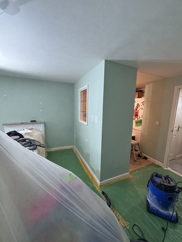 Interior painting in progress in Southampton showing wall preparation and room finishing
