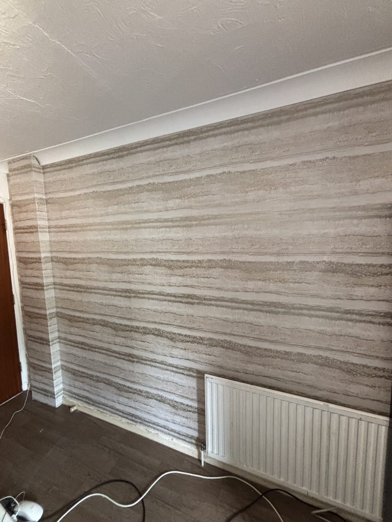 Completed dining room wallpapering project with feature wall in Southampton