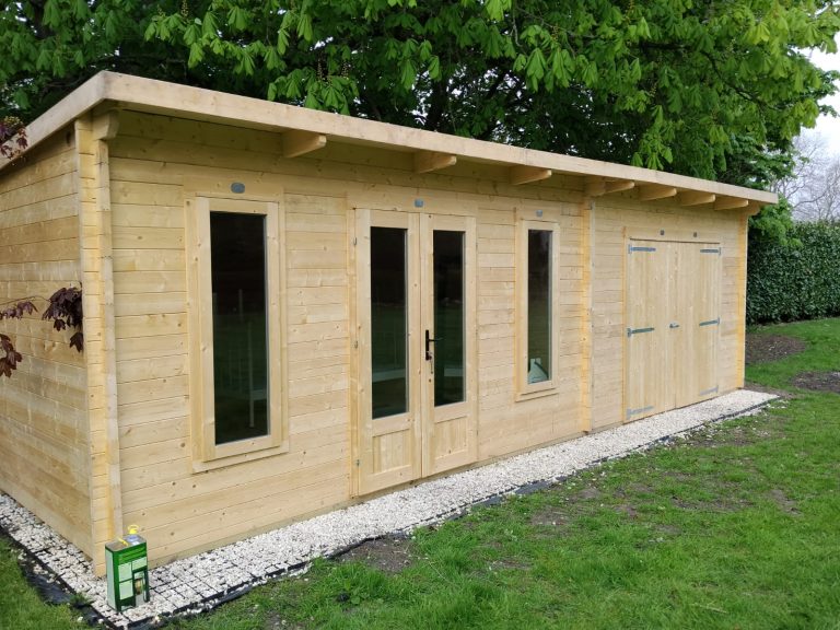 Wooden summer house before exterior painting and wood protection treatment in Southampton
