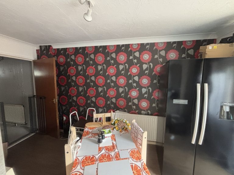 Dining room feature wall before wallpaper removal and refurbishment in Southampton