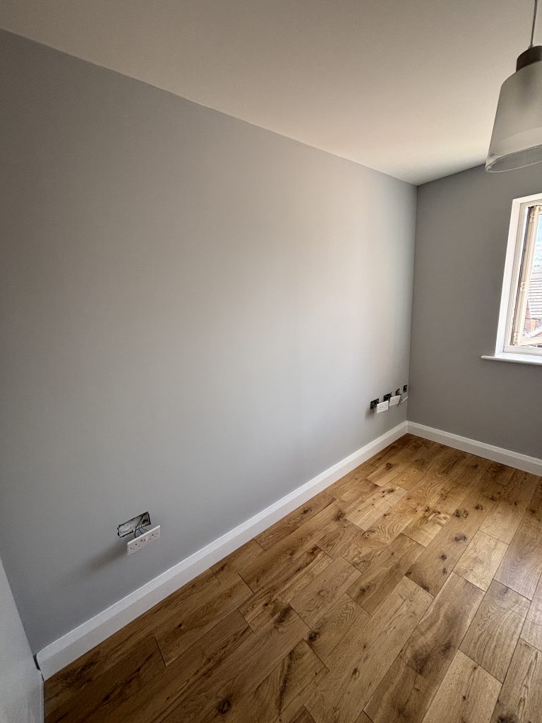 Freshly painted home office after wall repairs in Southampton