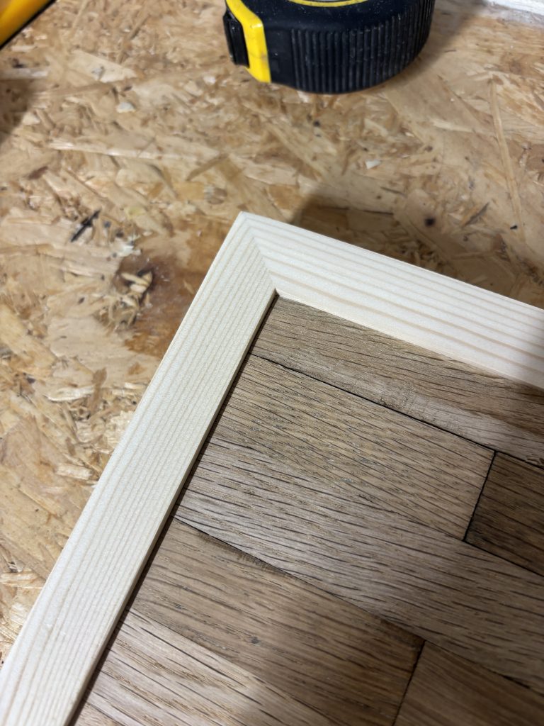 Handmade reclaimed oak clock during final assembly