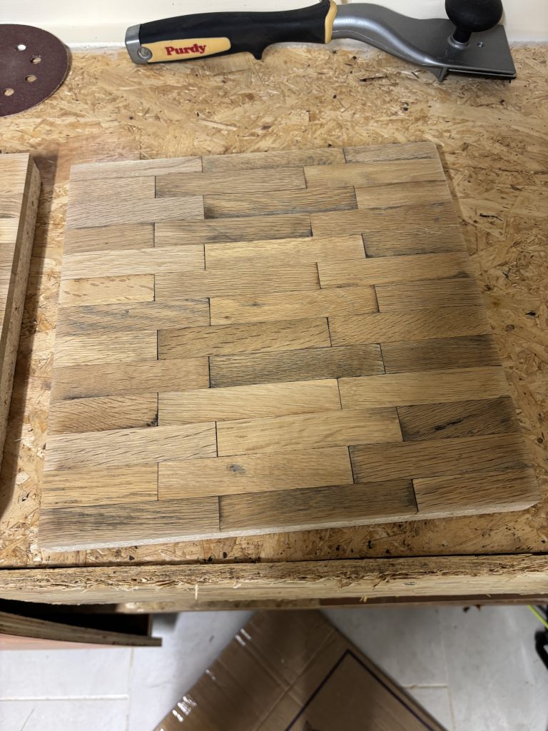 Reclaimed oak clock face after sanding and preparation